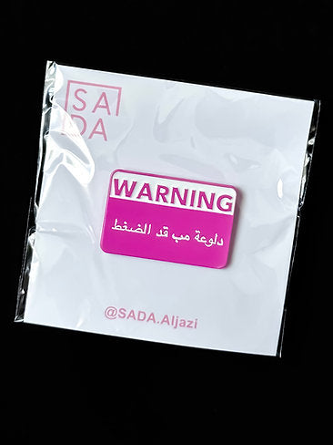 SADA pin-Pink warning